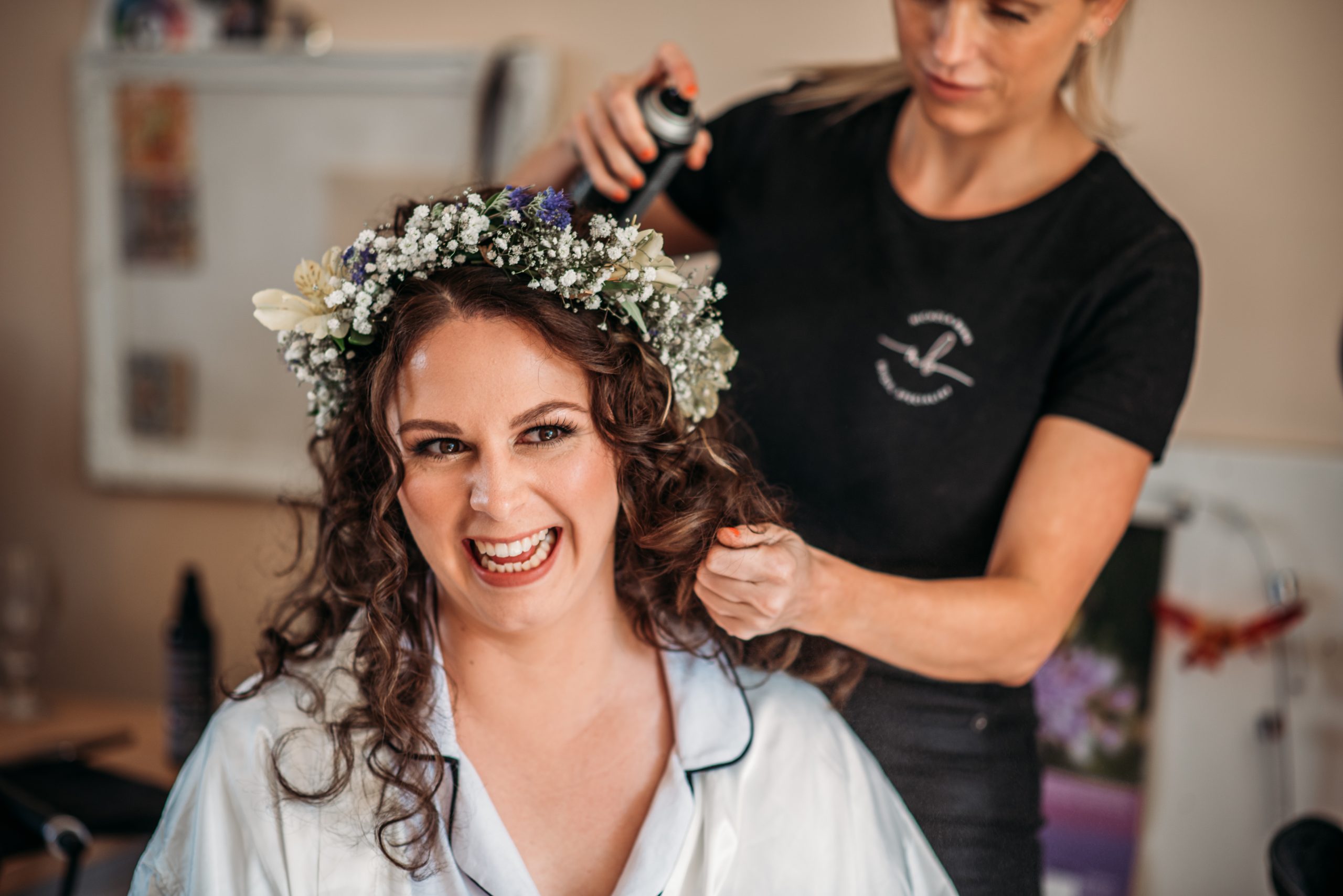 Gloucestershire wedding photographer. Candid moment of bride getting ready