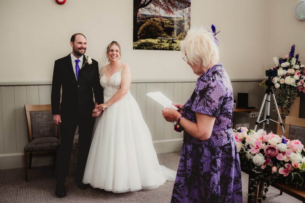 Reading during an intimate Gloucestershire wedding at stroud registry office