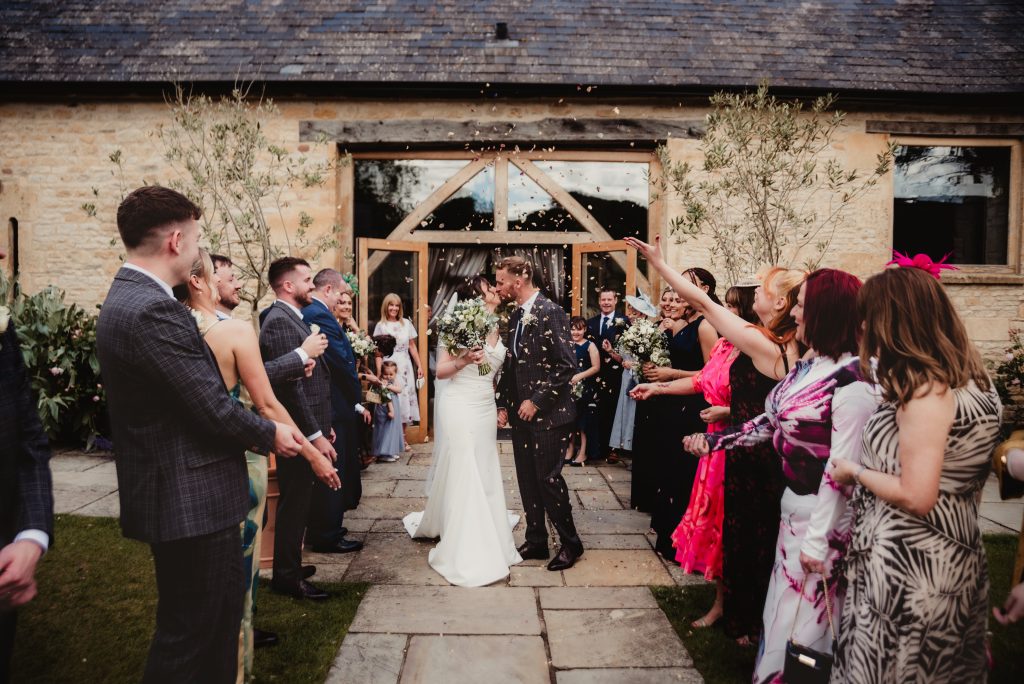 confetti moments captured by a cotswold wedding photographer at the barn at Upcote